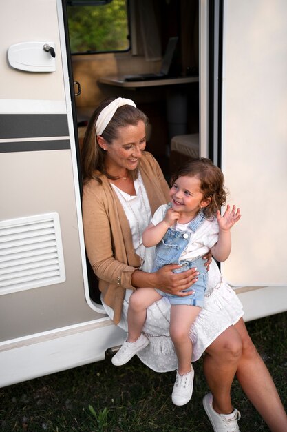 Nomad family having fun together in tiny house