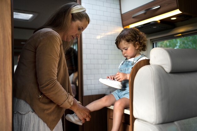 Nomad family having fun together in tiny house