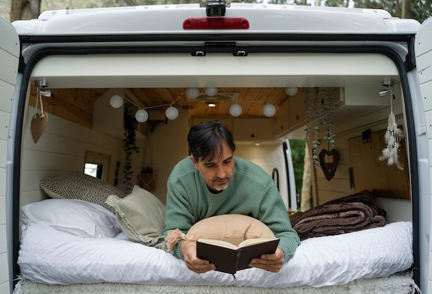 Free photo nomad man traveling with family