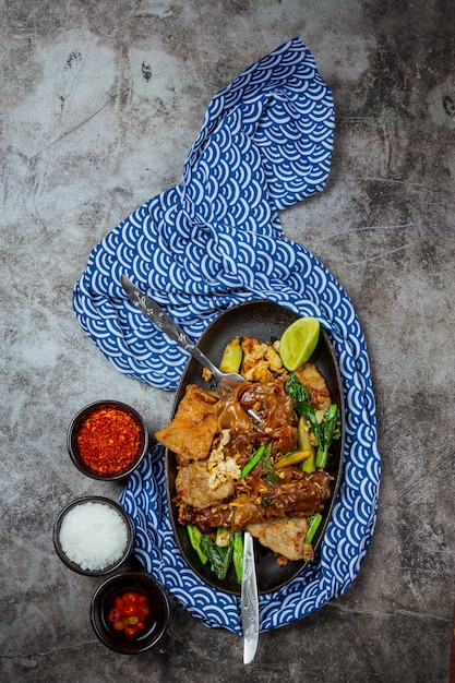 Noodles topped with big pork, Thai food