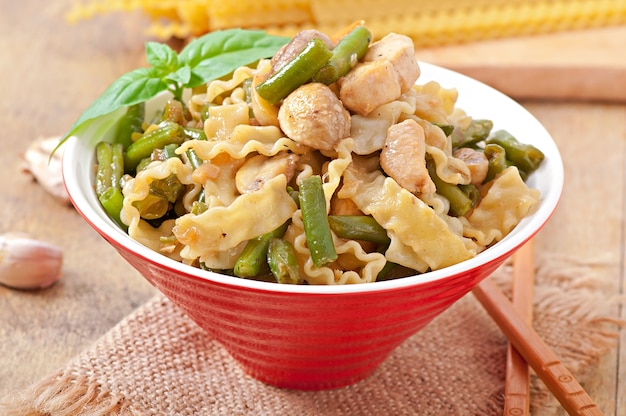 Noodles with meat, beans and mushrooms