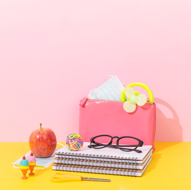 Notebook for back to school with glasses and apple