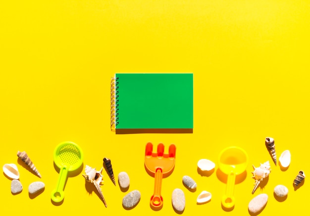 Notebook and beach toys