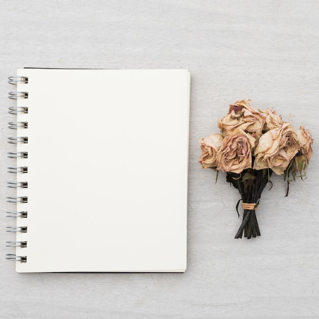 Notebook and bouquet