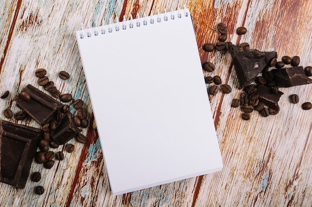 Notebook between chocolate and coffee 