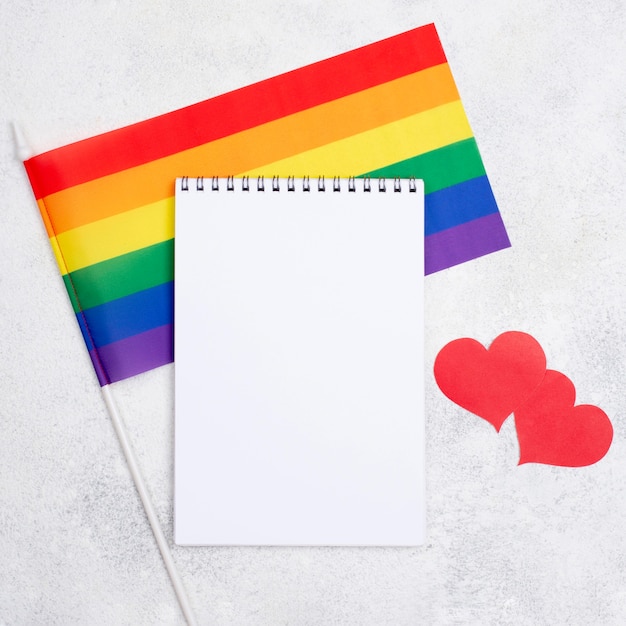 Free photo notebook and pride day flag