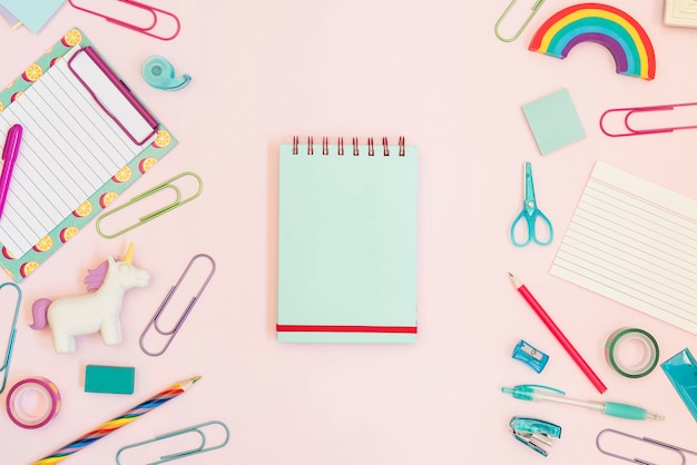 Notebook with colorful school supplies