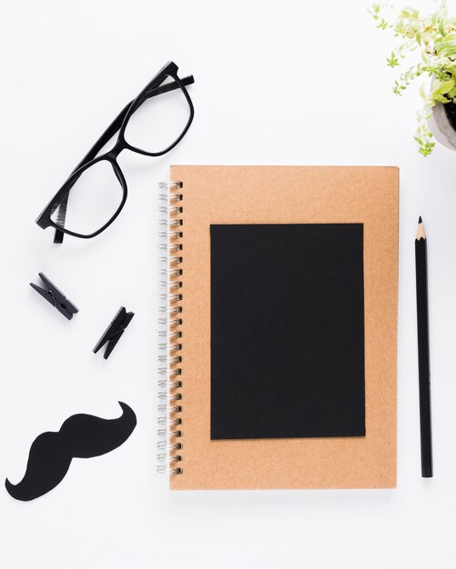 Notebook with glasses