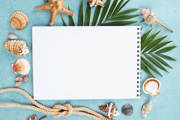 Notebook with nautical rope beside