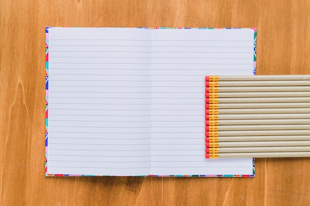 Notebook with pencils