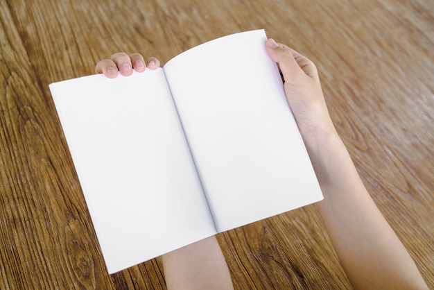 Free photo notebook on a wooden table