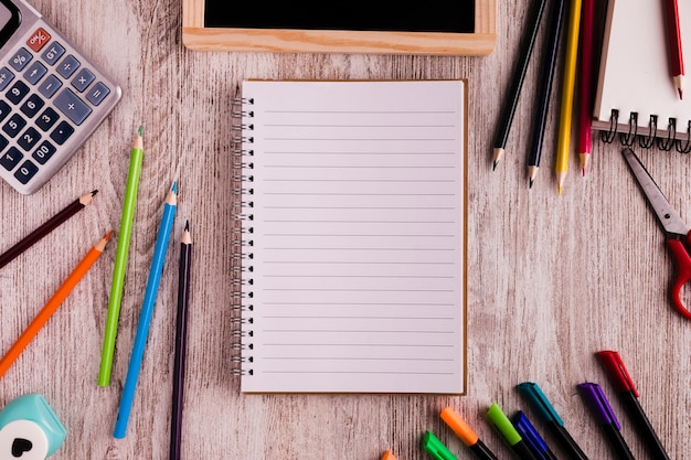 Notepad and drawing set on desk