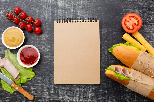 Notepad surrounded by food