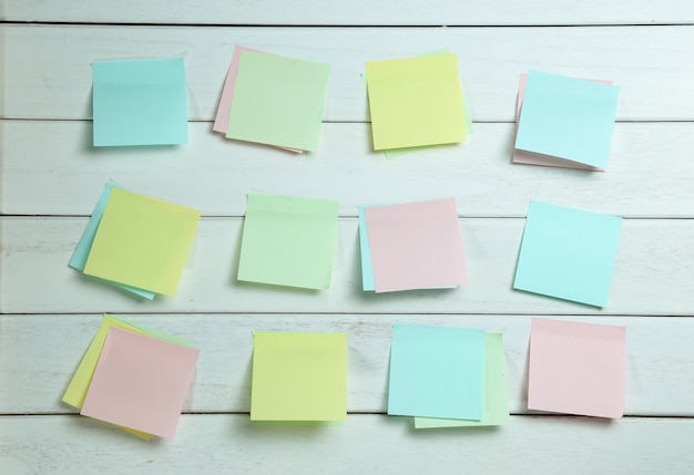 notepapers sticked on white wooden board