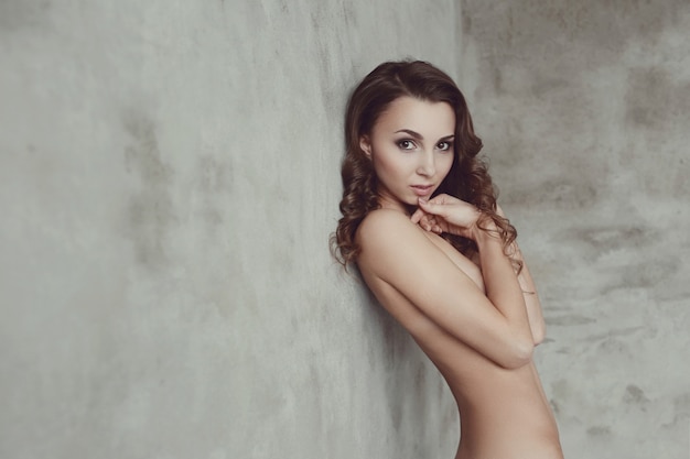 Nude and naked model with curly hairs