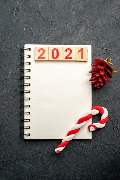 Number 2021 over notebook. Happy new year