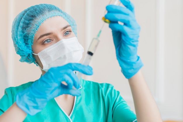 Nurse with syringe