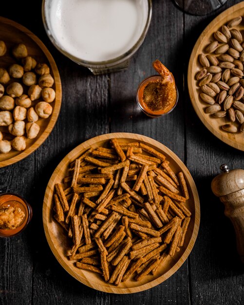 Nuts, snacks and a glass of yogurt.