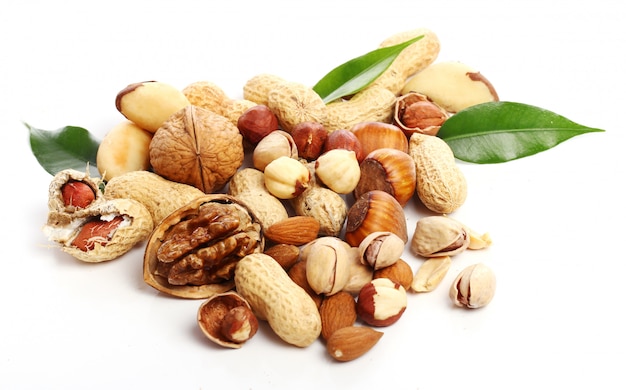 Nuts,walnut, peanuts and almond seeds Free Photo