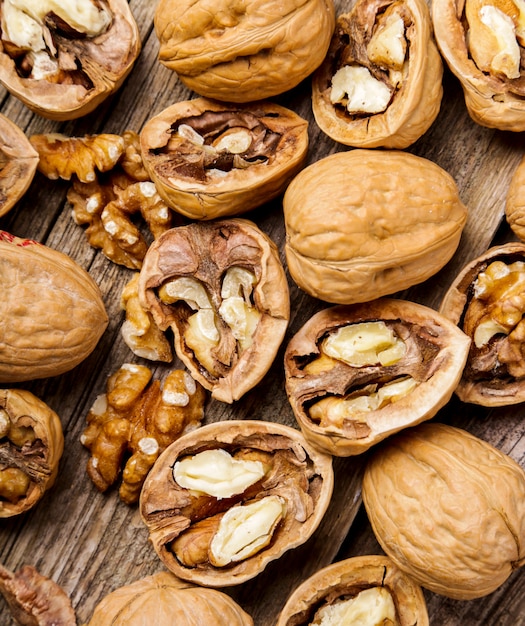 Nuts. Walnuts on a dark wood background