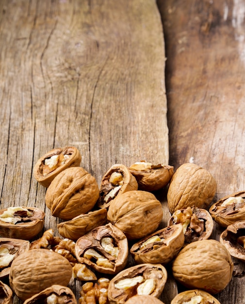 Nuts. Walnuts on a dark wood background