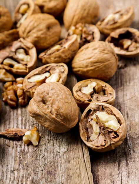 Nuts. Walnuts on a dark wood background