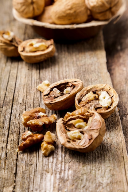 Nuts. Walnuts on a dark wood background