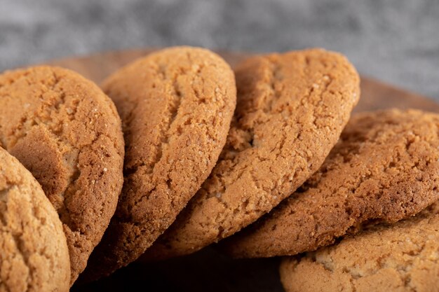 Oatmeal cookies isolated on grey concrete.