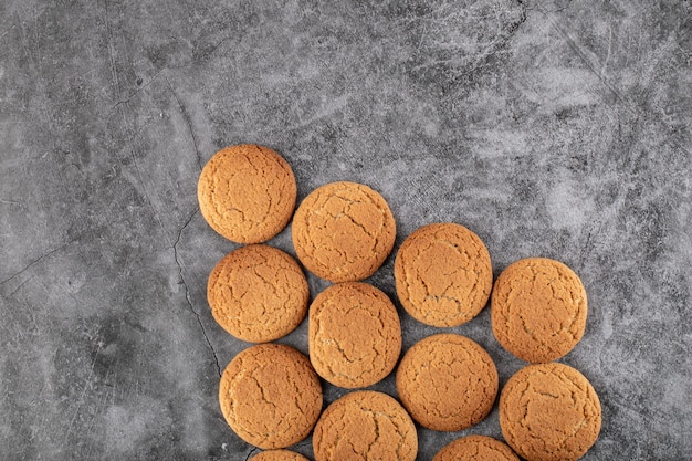 Oatmeal cookies isolated on grey concrete.