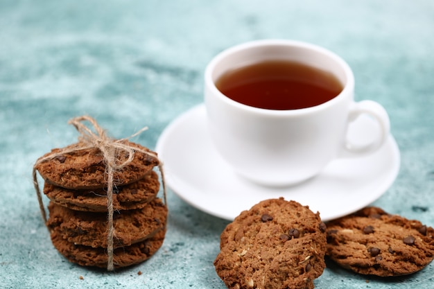 Oatmeal cookies with a cup of tea.