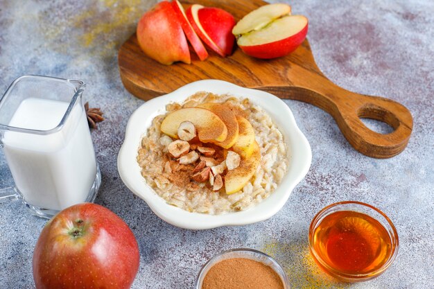 Oatmeal porridge with apples and cinnamon.