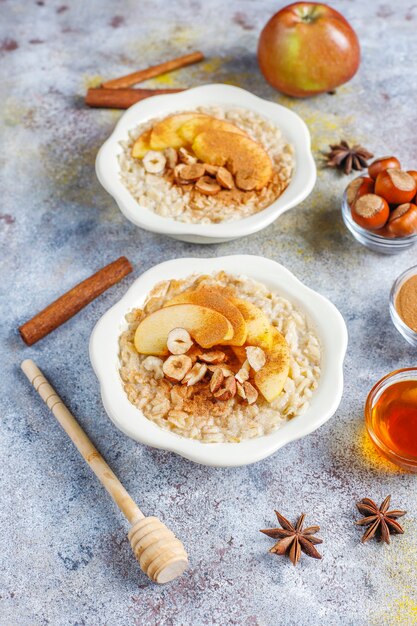 Oatmeal porridge with apples and cinnamon.