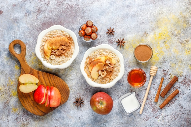 Oatmeal porridge with apples and cinnamon.