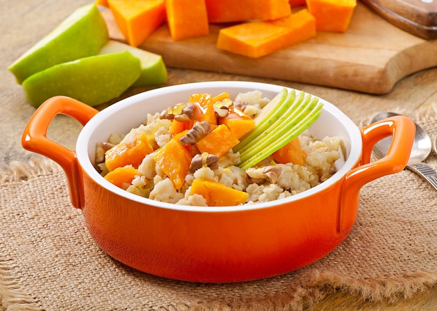 Oatmeal with pumpkin, apples, nuts and honey