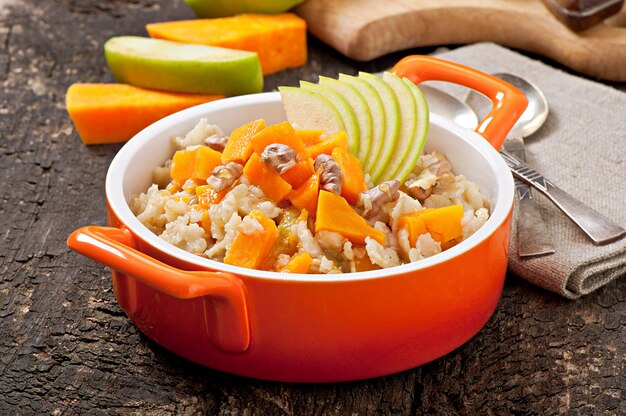 Oatmeal with pumpkin, apples, nuts and honey