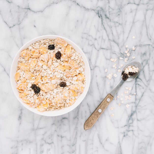 Oatmeal with raisins in big bowl