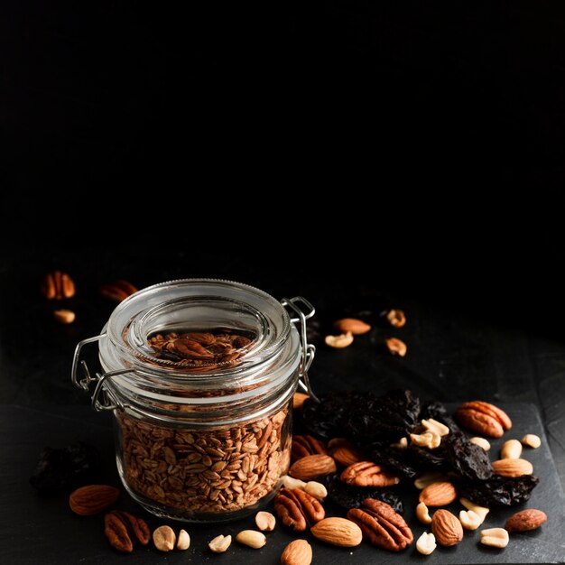 Oats jar with nuts mix and dates