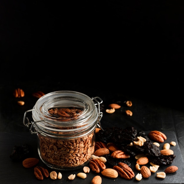 Oats jar with nuts mix and dates