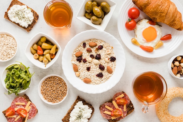 Oats nuts and raisins with sandwiches