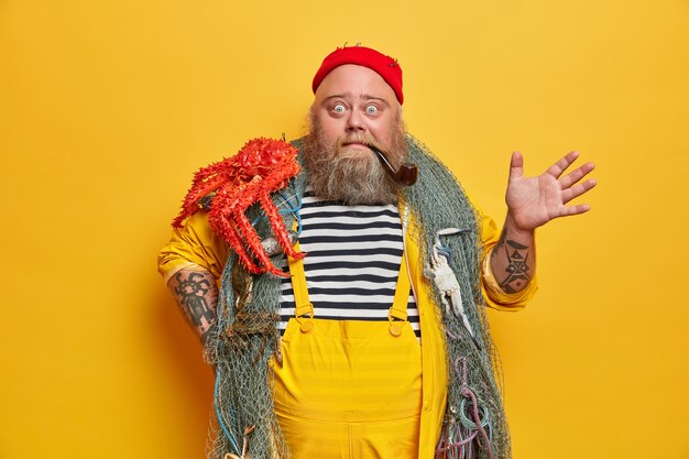 Obese bearded male sailor wiith fishing net