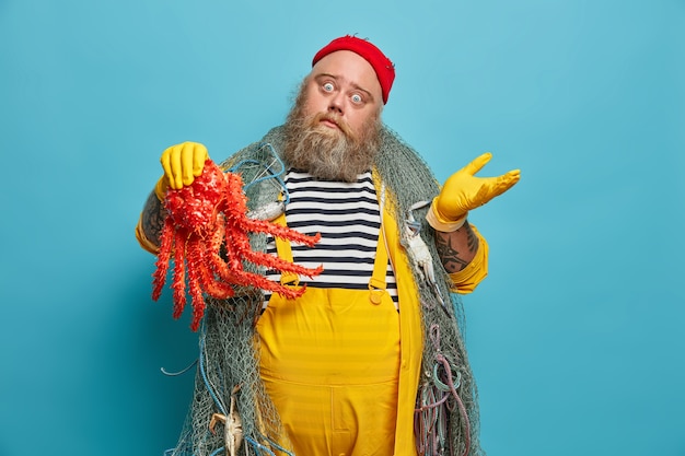 Obese bearded male sailor wiith fishing net