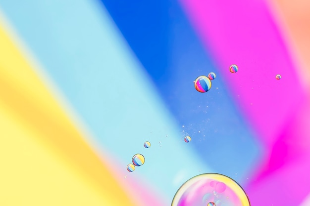 Oblique rainbow rays and bubbles