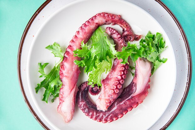 Octopus salad seafood fresh meal snack on the table copy space food background vegetarian