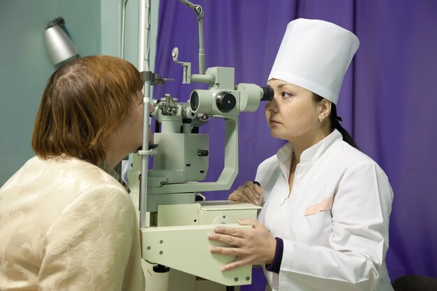 oculist and patient testing  eyesight