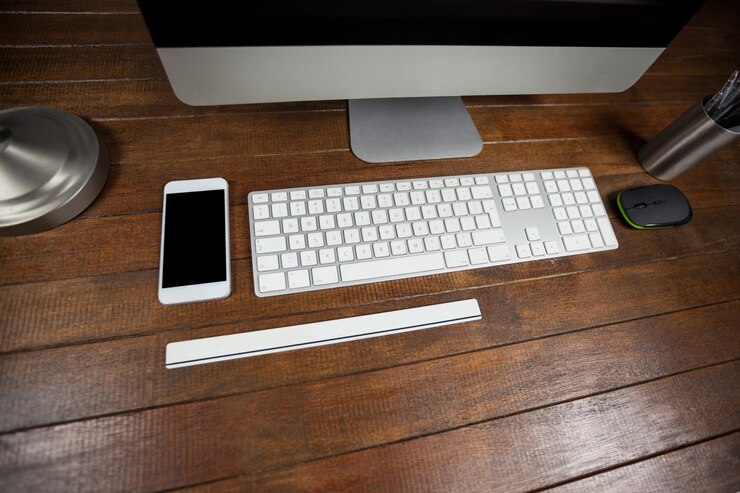 Free Photo office desk with computer and mobile phone