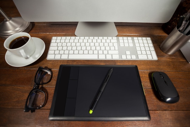 Office desk with pc, mobile phone and belongings