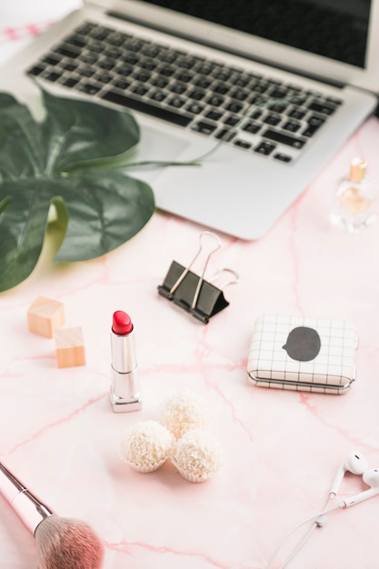 Free photo office desktop with a lipstick