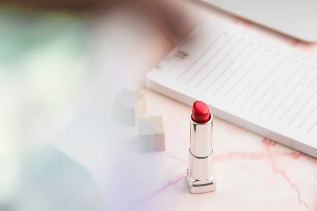 Free photo office desktop with a lipstick