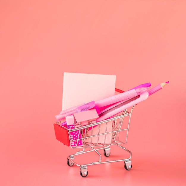 Free photo office incidentals in shopping trolley