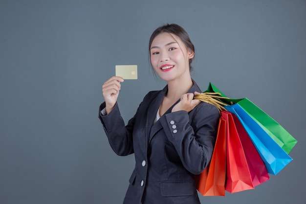 Office lady holding a fashion shopping bag